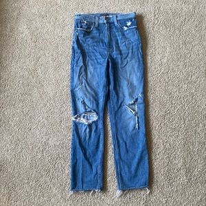 Ripped blue jeans